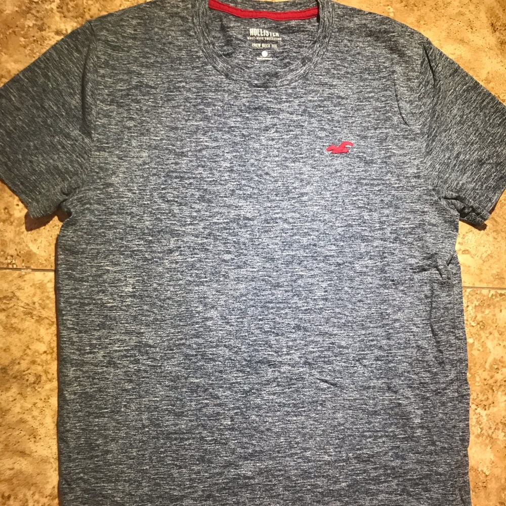 Blue Hollister Shirt with Cool texture to the look